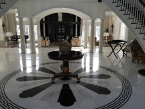 A Black and White Color Marble Flooring of a House